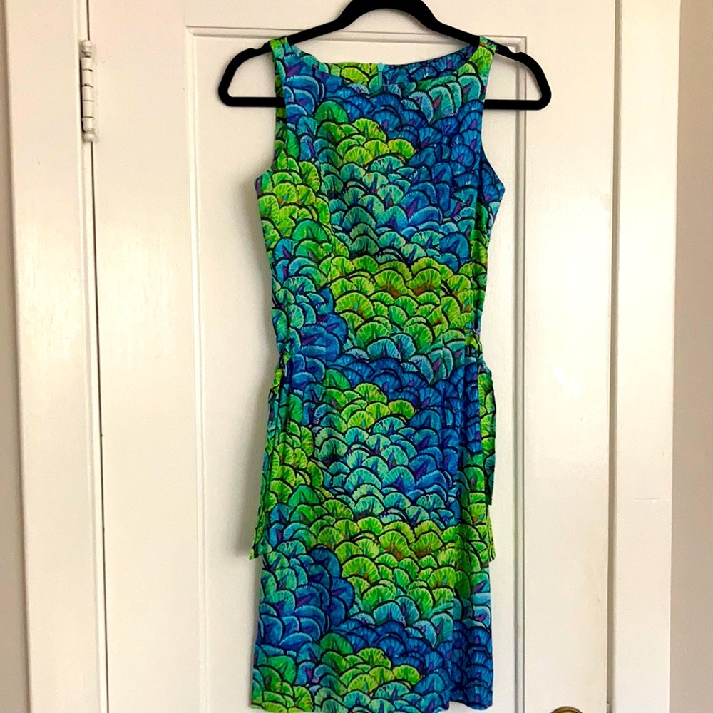 Lenny Niemeyer fitted cocktail dress with tropical design and colors.